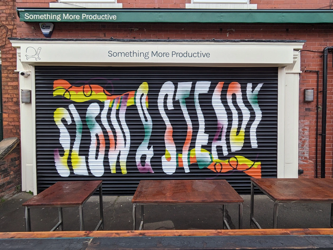 Photo of Becky's colourful outdoor mural work